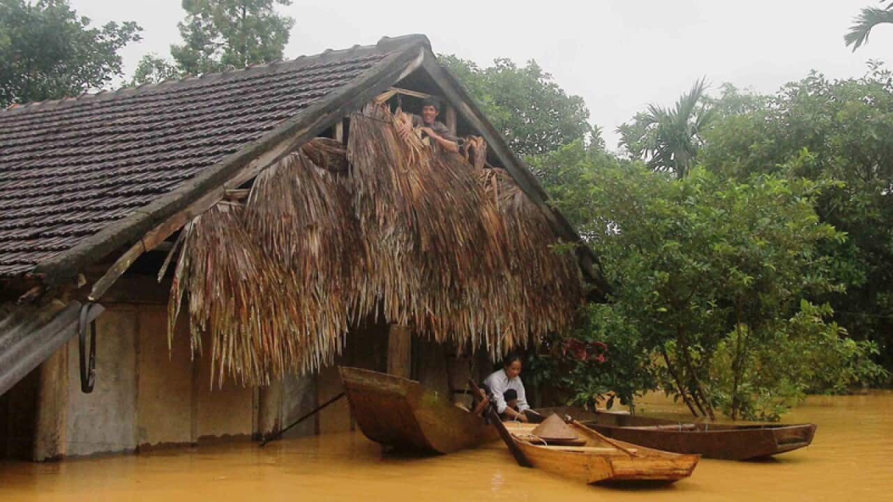 Floodwaters surround a house in Ha Tinh province, Vietnam