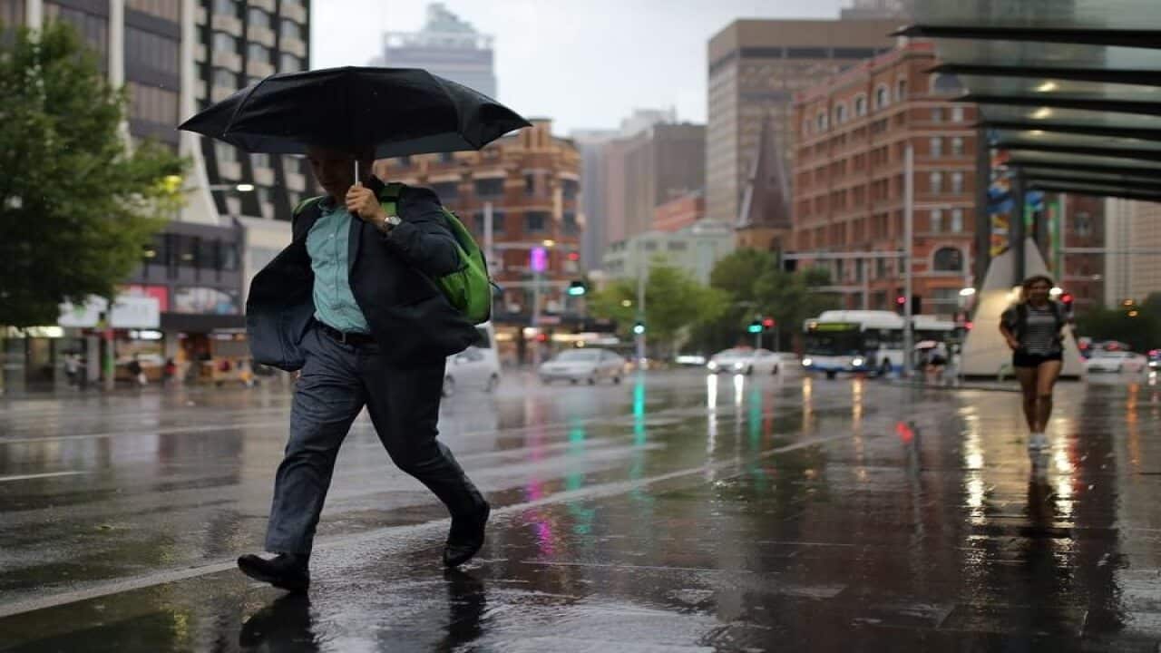 Pedestrians are seen in Sydney's CBD.