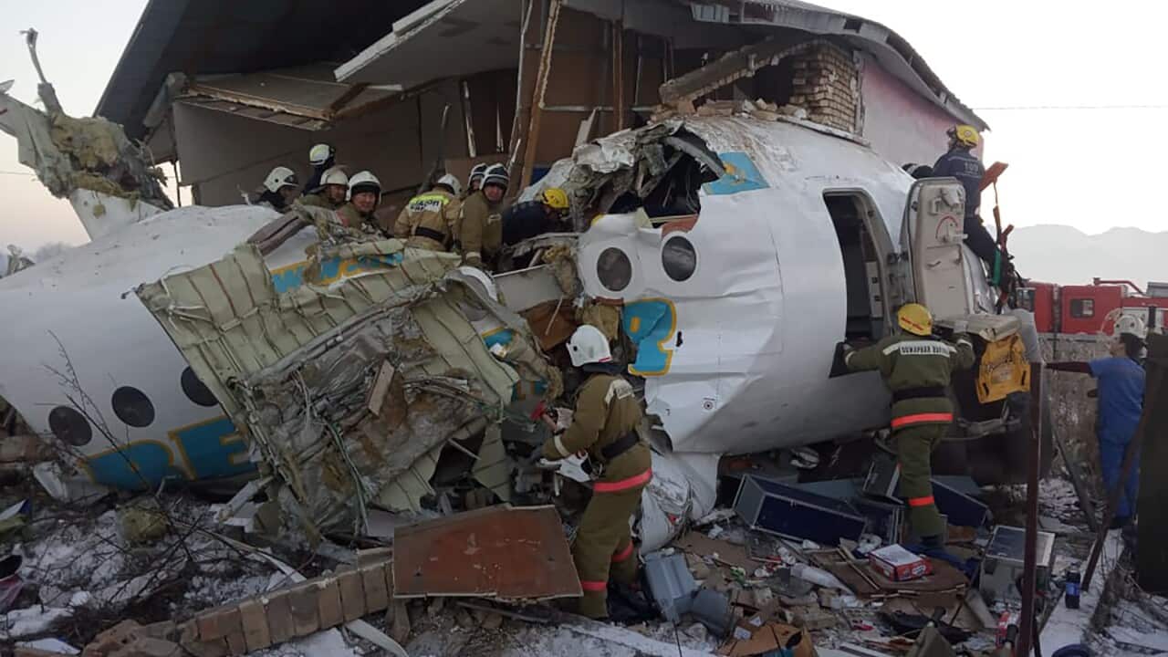 The site of a crash of a Bek Air plane carrying 95 passengers and 5 crew members near Almaty Airport.