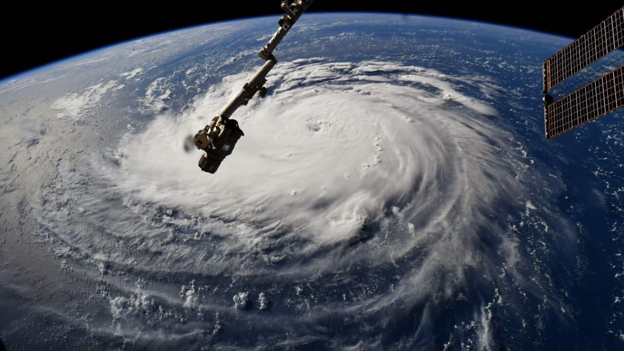 A handout photo made available by NASA shows Hurricane Florence over the Atlantic Ocean, seen from the International Space Station