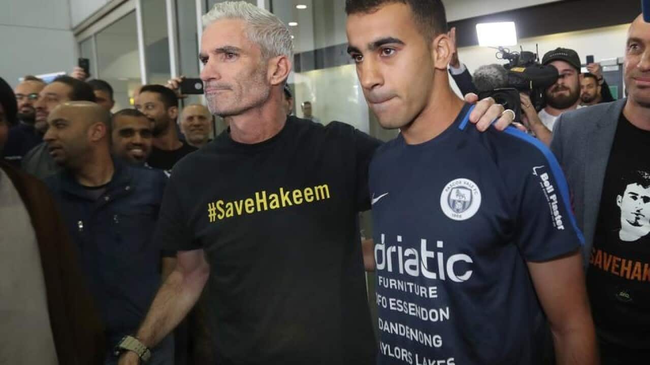 Former Socceroo Craig Foster with refugee footballer Hakeem Al-Araibi