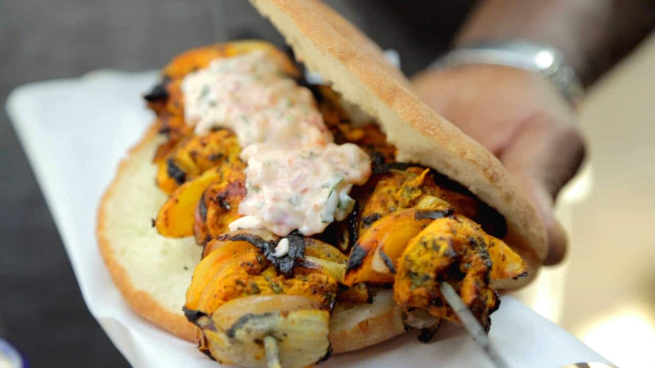 Marinated chicken kebabs with preserved lemon and harissa yoghurt dressing (djej mechoi)