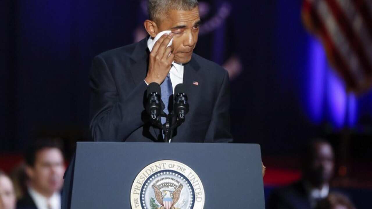 Barack Obama wipes away tears during his farewell speech in Chicago (AAP
