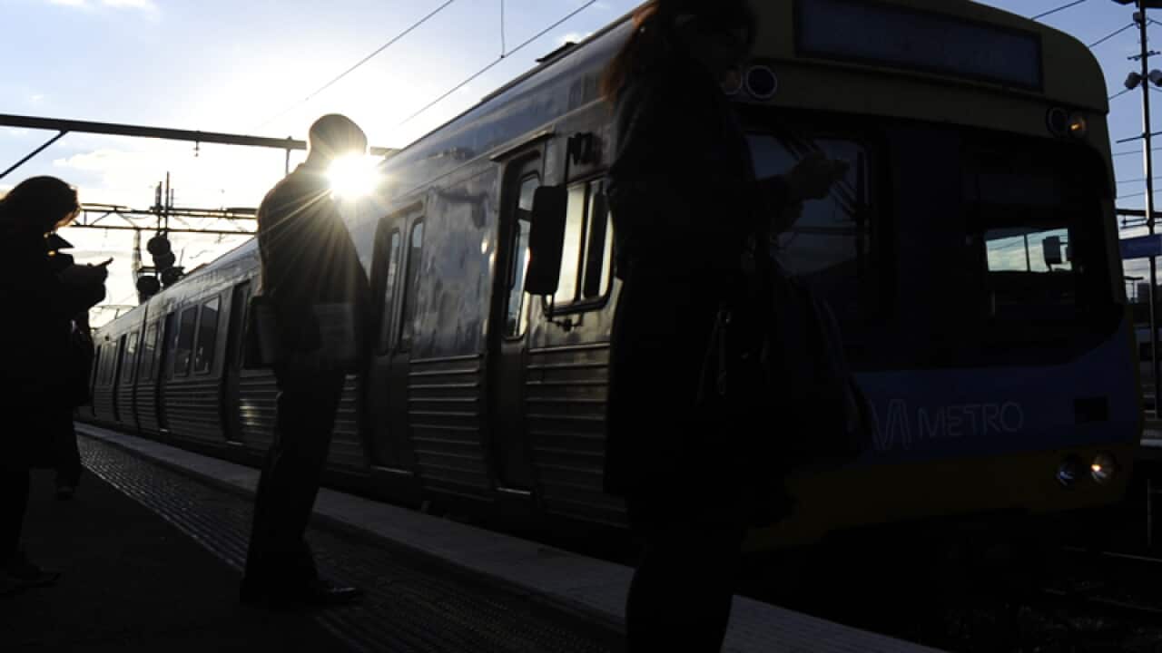 A Metro train approaches Richmond station in Melbourne.