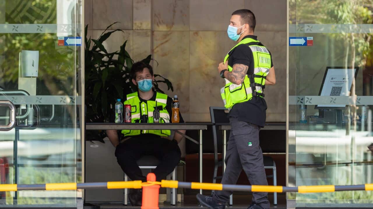 Security guards are seen at the Four Points Sheraton hotel in Perth