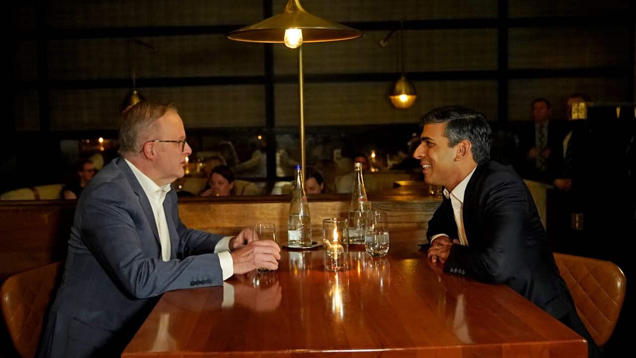 Anthony Albanese and Rishi Sunak seated at a table at a San Diego seafood restaurant