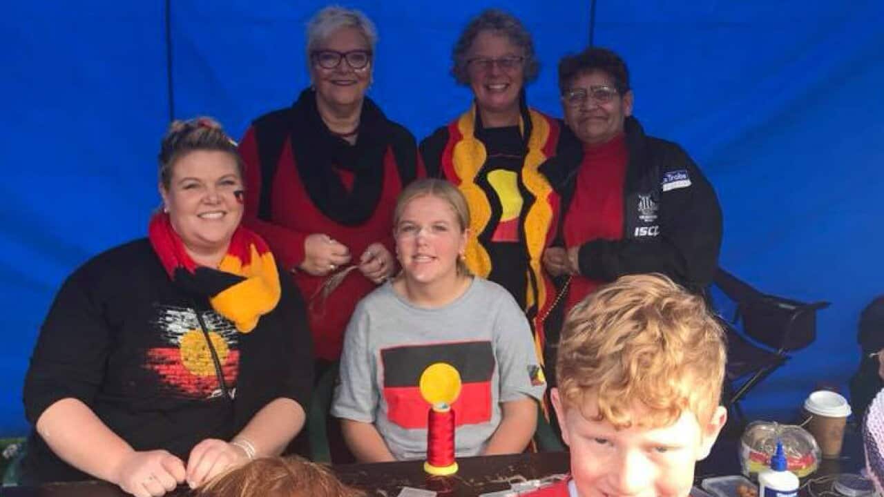 Aunty Naomi Surtees (back left )making jewellery with family and friends. Reconciliation in the Park 2018. Johnstone Park Geelong 2018.
