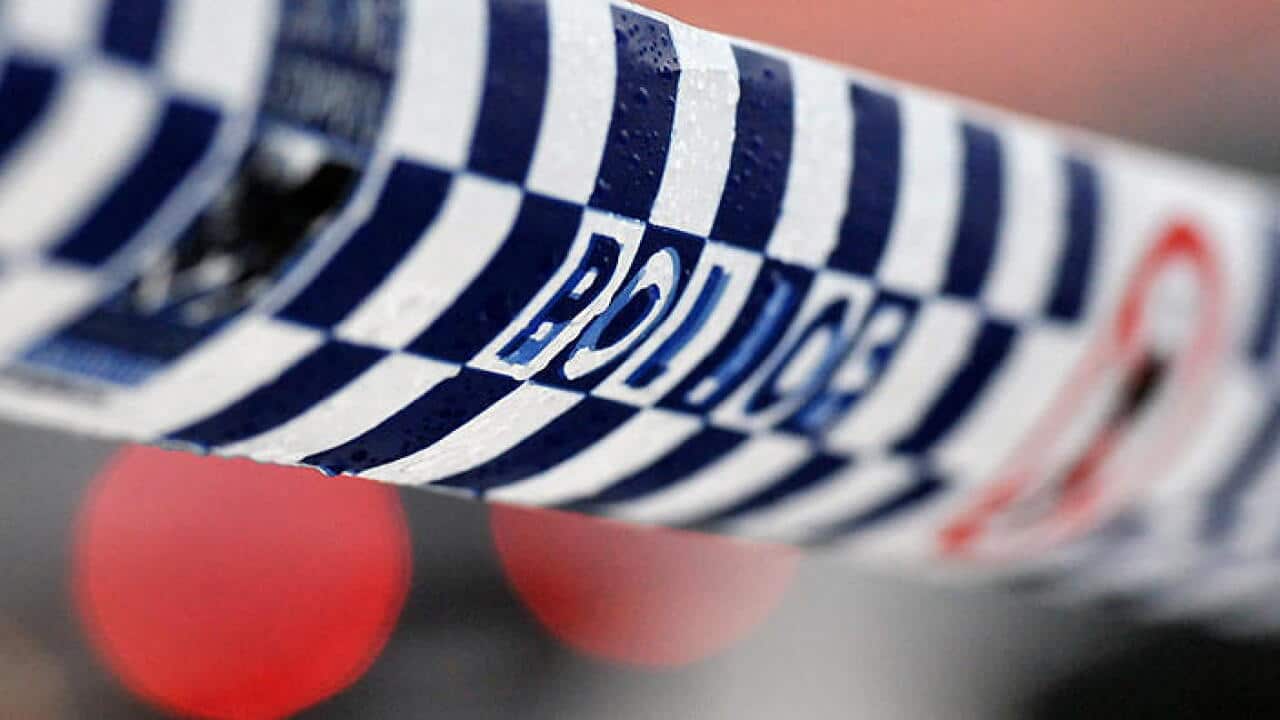 Police tape restricts access to a crime scene north of Sydney, Friday, July 24, 2015. (AAP Image/Joel Carrett) NO ARCHIVING