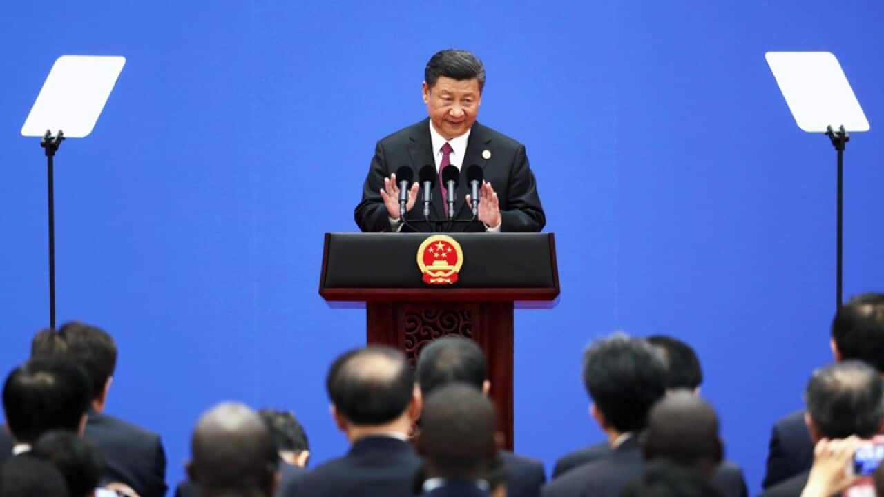 Chinese President Xi Jinping attends a news conference