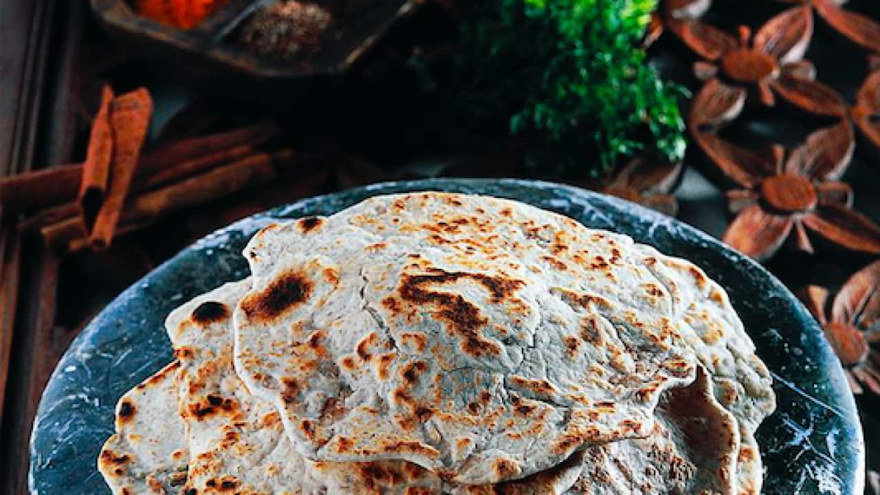 A Nyonya Cooking advertisement depicting roti canai renamed the south-east Asian dish, “Asian flat croissant”.