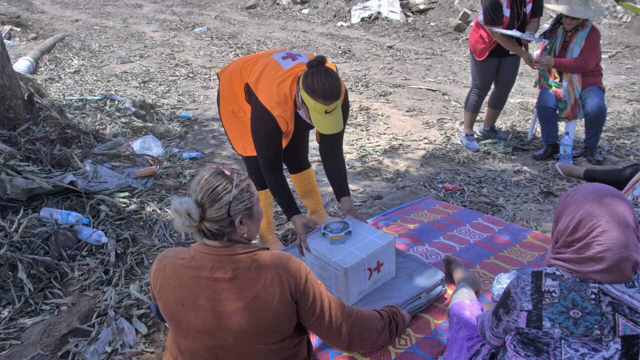 Red Cross teams deliver relief items to families in Kanokupolu, western Tongatapu on 21 January 2022,