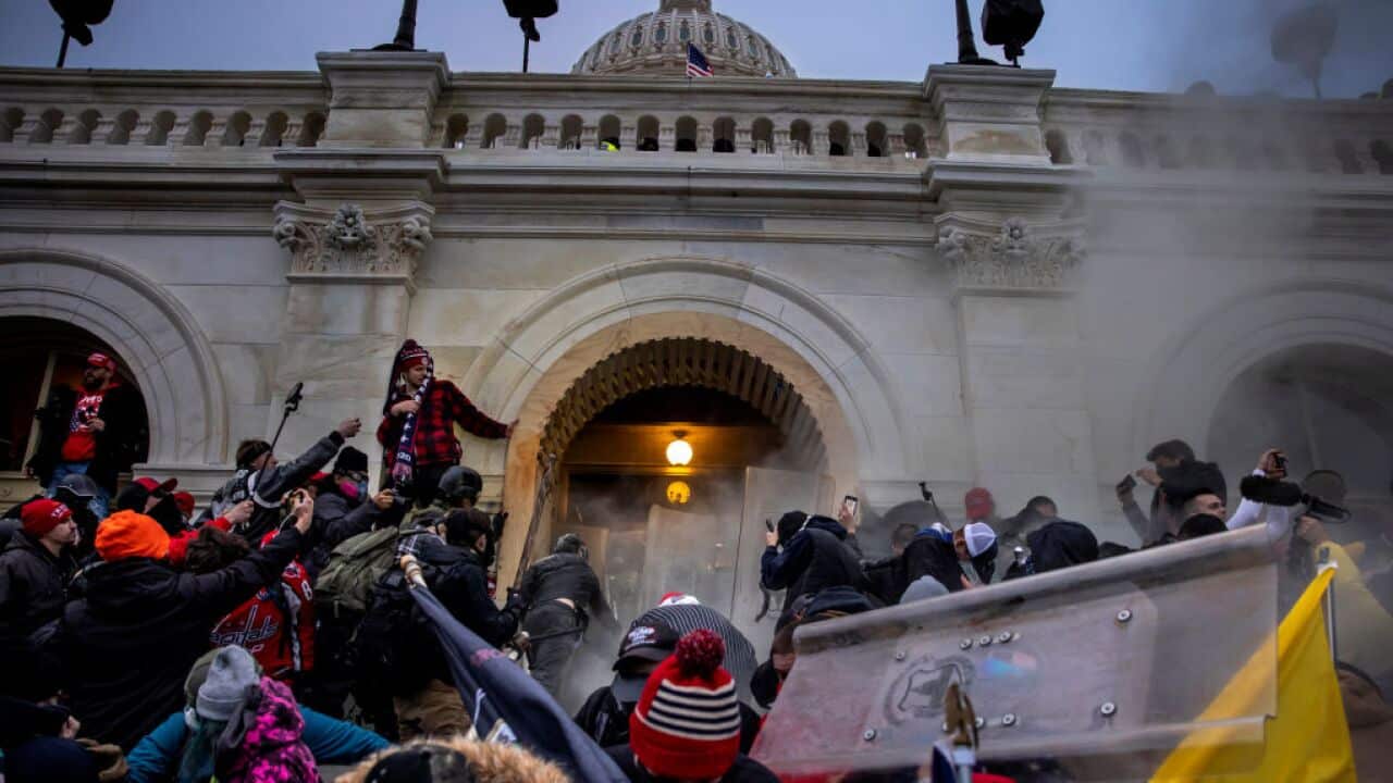 Donald Trump supporters try to storm the US Capitol on 6 January 2021.