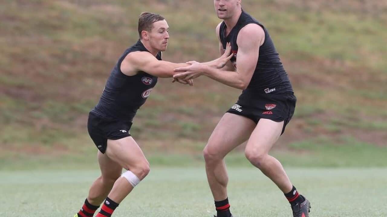 Essendon recruits Devon Smith (L) and Jake Stringer