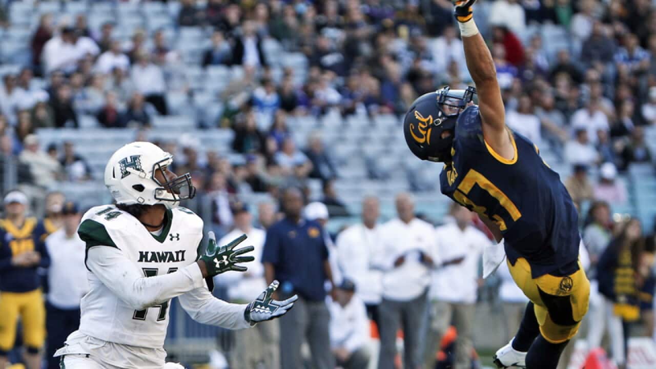 California Golden Bears safety Damariay Drew, right, leaps