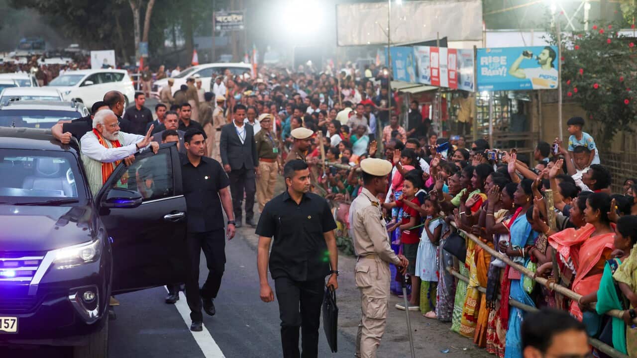 India: PM Modi being welcomed by people as he holds a roadshow in Kaziranga