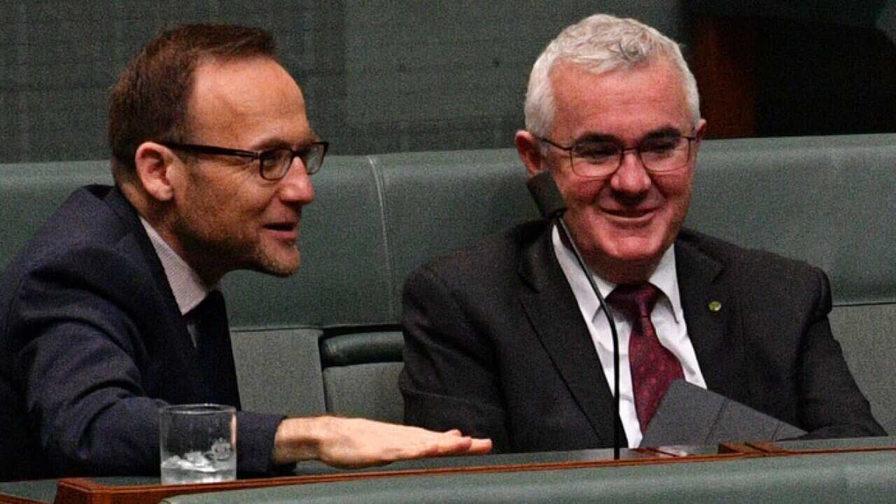 The Greens' Adam Bandt, left, and independent Andrew Wilkie