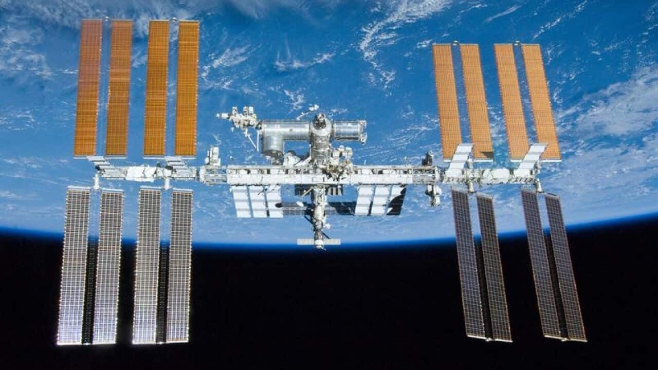 International Space Station with the Earth in the background.