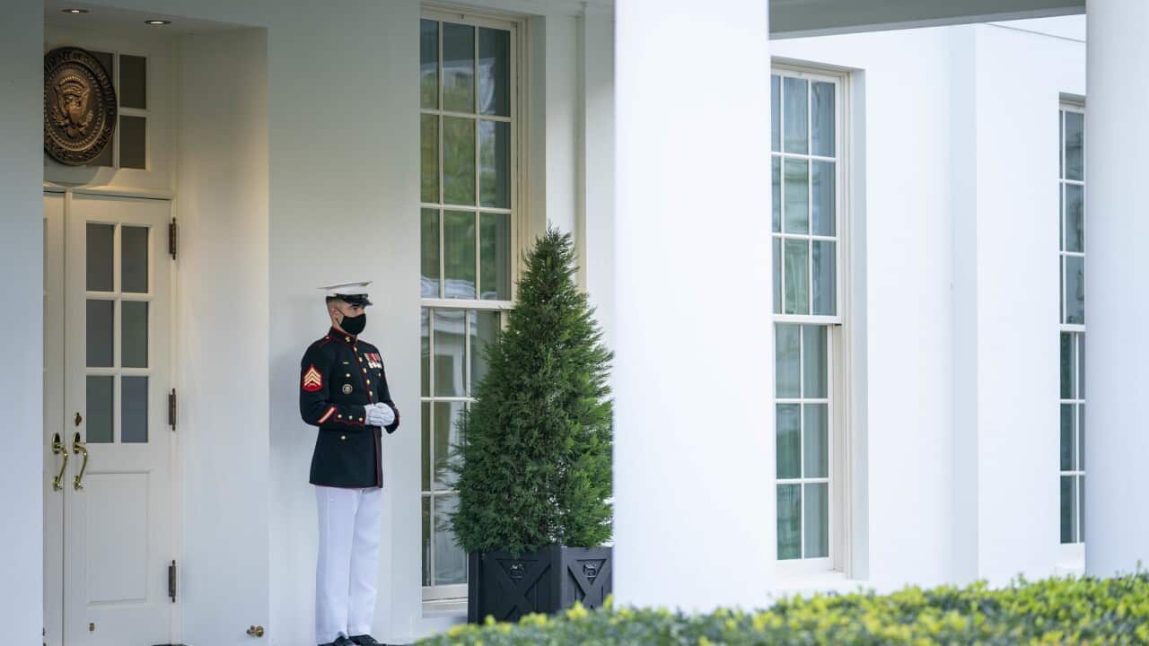 A Marine on duty outside the Oval Office where US President Donald Trump is reportedly being briefed
