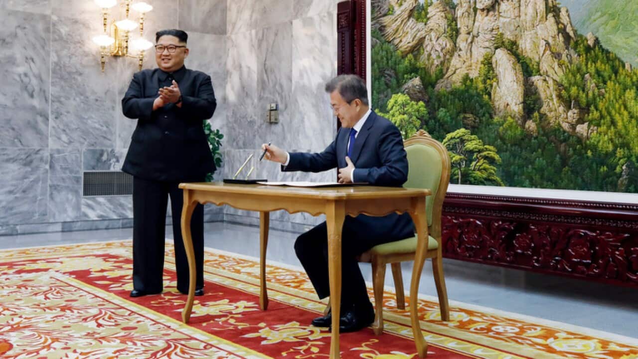 South Korean president Moon Jae-In, right, and North Korean leader Kim Jong-un held a surprise second meeting on the northern side of Panmunjom in the demilitarised zone