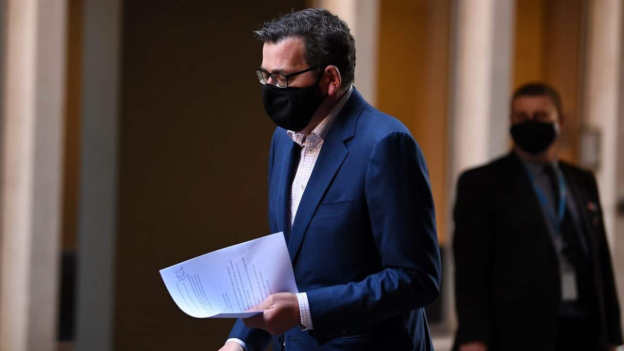 Victorian Premier Daniel Andrews arrives to a press conference in Melbourne