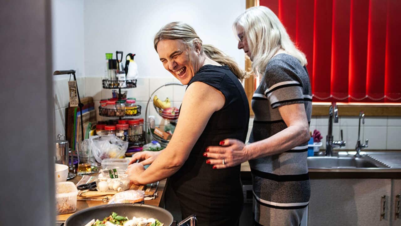 Gail and Lisette in their kitchen.