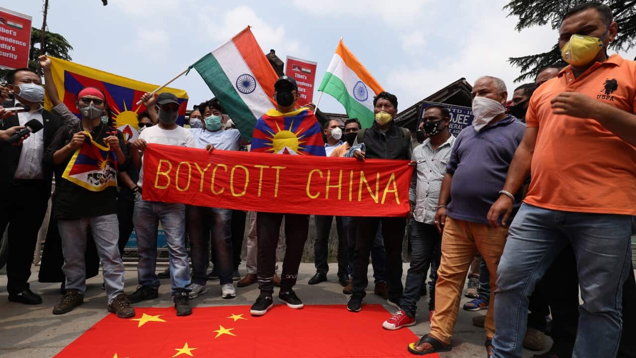 Tibetan and Indian activists hold a banner ''Boycott china'' at McLeod Ganj, near Dharamsala, India, 19 June 2020.