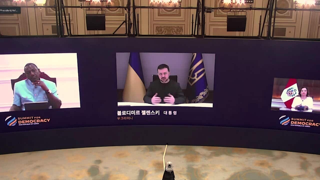 Volodymyr Zelenskyy speaking at the Summit via videolink (AP).jpg