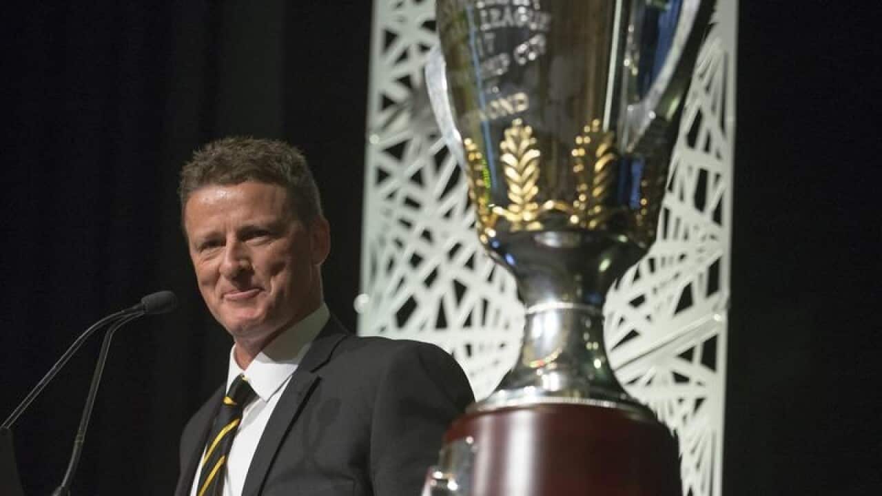 Richmond coach Damien Hardwick with AFL trophy
