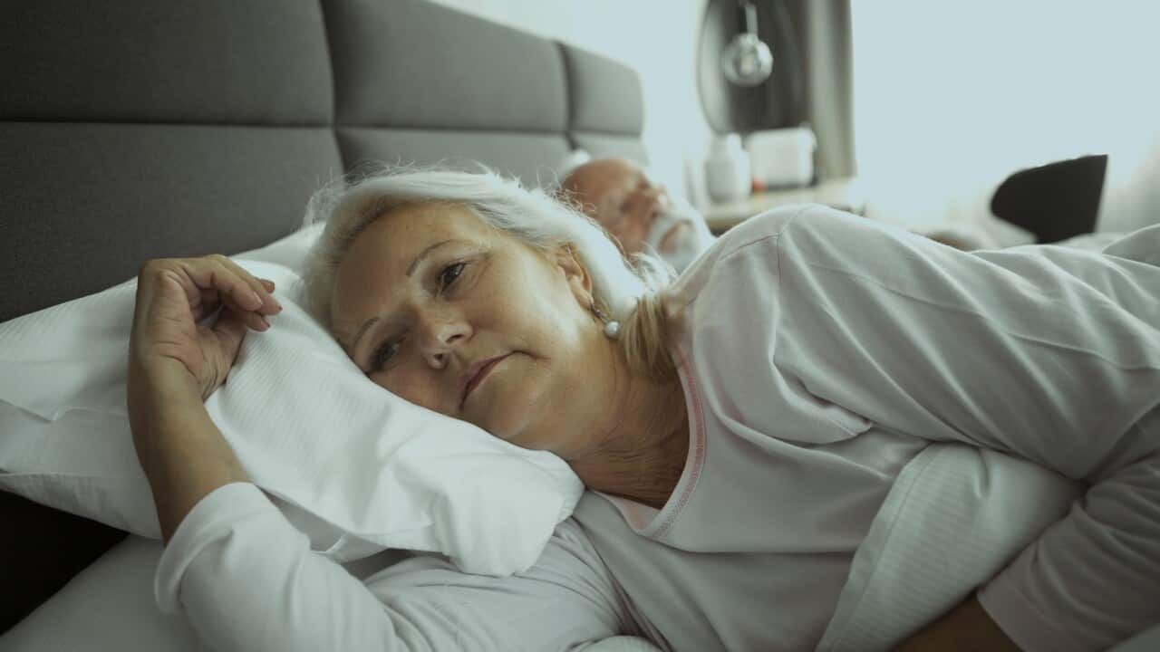 Senior couple sleeping ,senior woman having sleeping problem