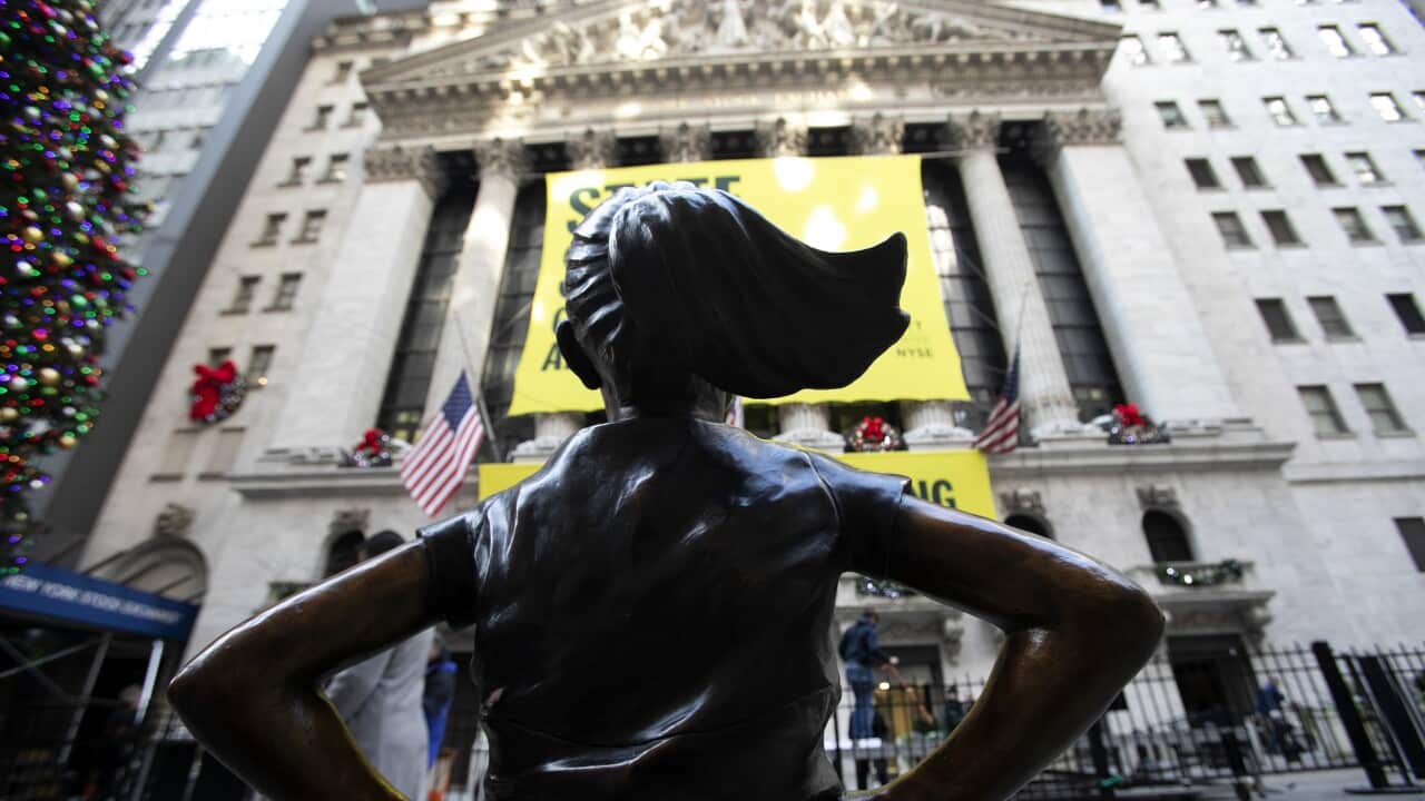 The Fearless Girl statue is unveiled at its new location in front of the New York Stock Exchange.