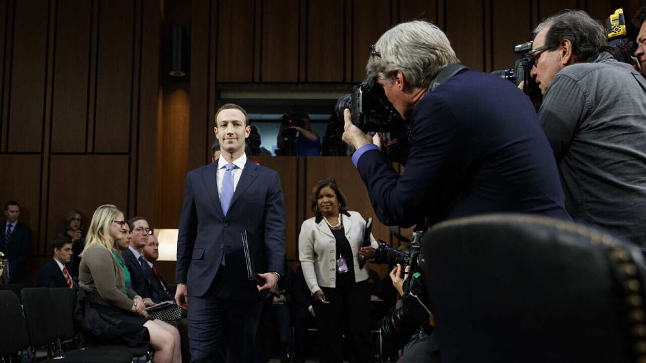 Facebook CEO Mark Zuckerberg arrives to testify before the joint hearing.