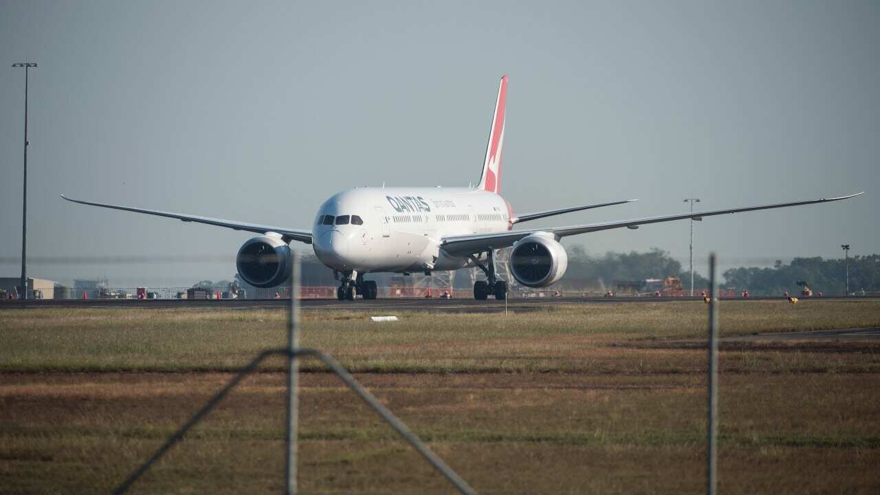 The Qantas repatriation flight from India is seen taxiing at RAAF Darwin in Darwin on Saturday, 15 May.