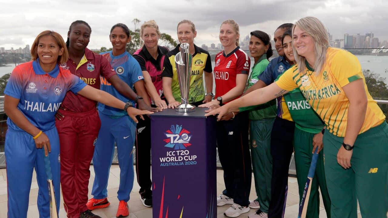 The captains of the 10 countries participating in the Women's T20 World Cup pose fore a photo with the trophy in Sydney, Monday, Feb. 17, 2020. The tournament begins Friday, Feb. 21. From left to right are, Sornnarin Tippoch of Thailand, Stafanie Taylor o