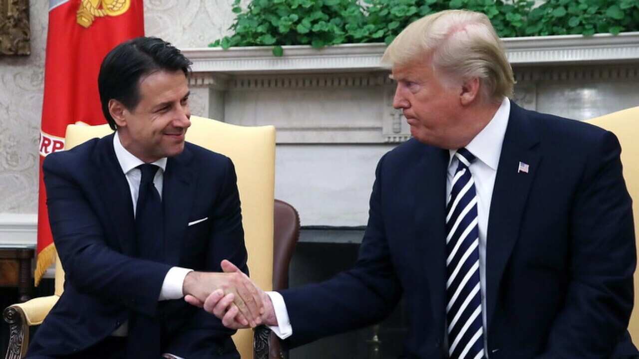 US President Donald J. Trump (R) shakes hands with Italian Prime Minister Giuseppe Conte (L) in the Oval Office of the White House, in Washington, DC, USA, 30 July 2018. EPA/Mark Wilson / POOL ISP POOL