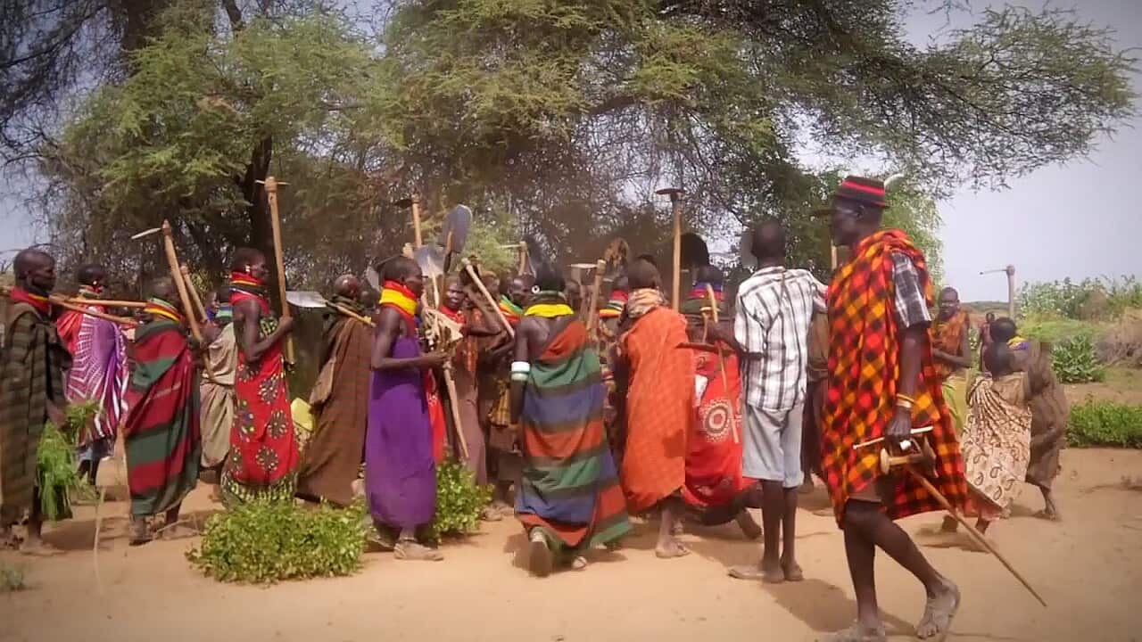 Kangalitai villagers dancing and singing