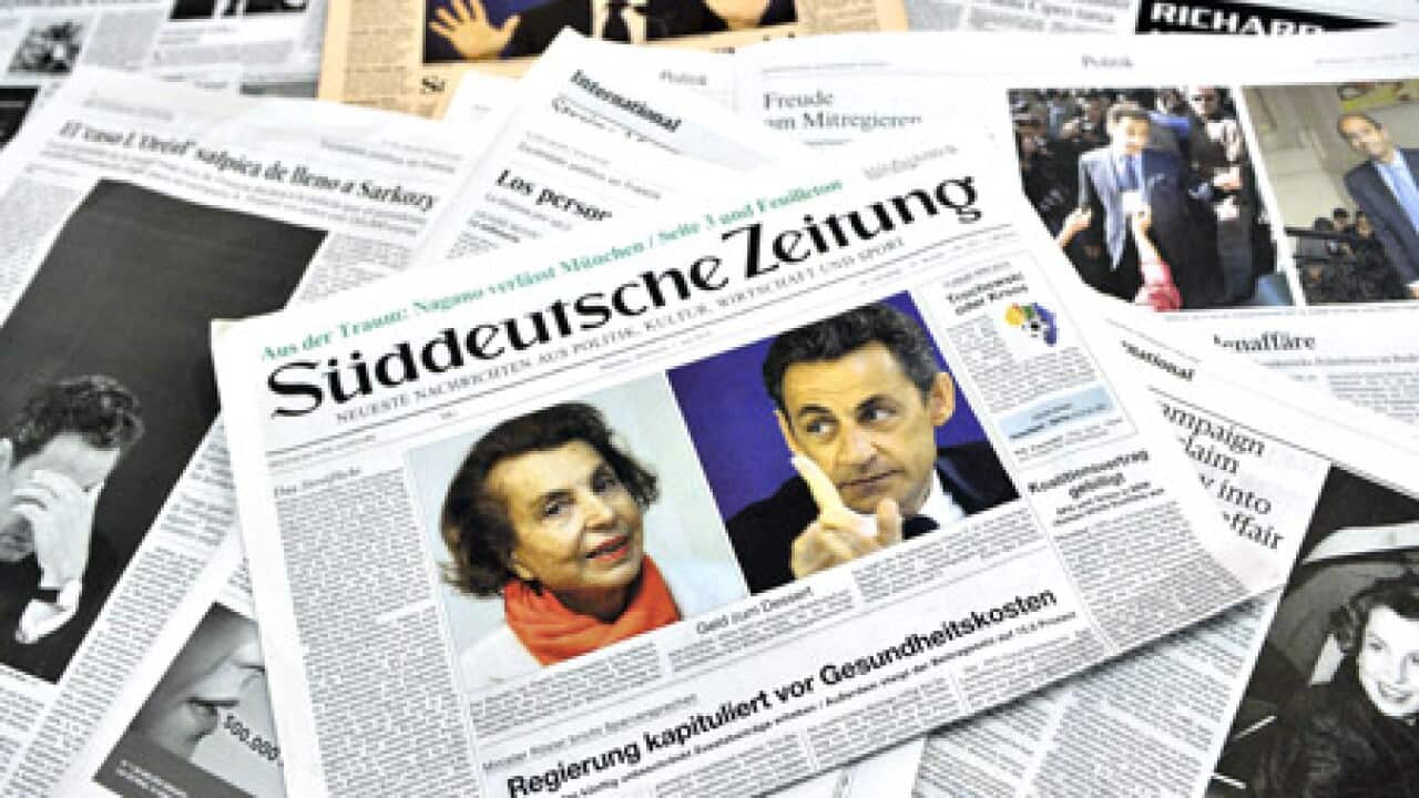 sarkozy_papers_scandal_100708_B_getty_1244075524