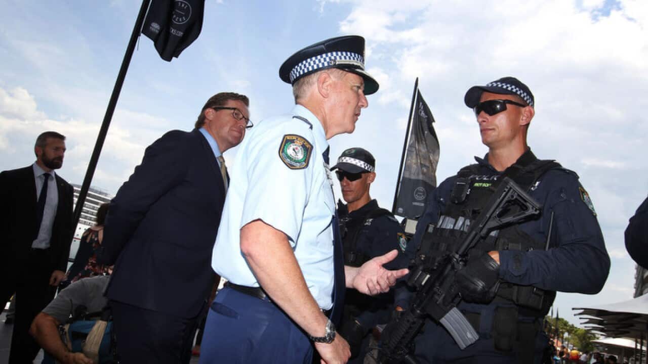 NSW Police Commissioner Mick Fuller does a media presser with the media and the Public Order and Riot Squad equipped with M4 Carbine guns