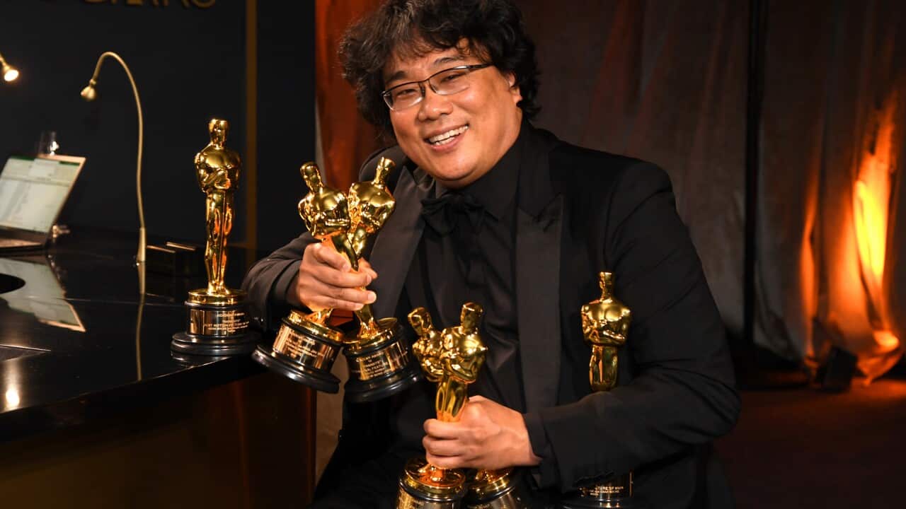 Bong Joon-ho with the Oscars for Parasite
