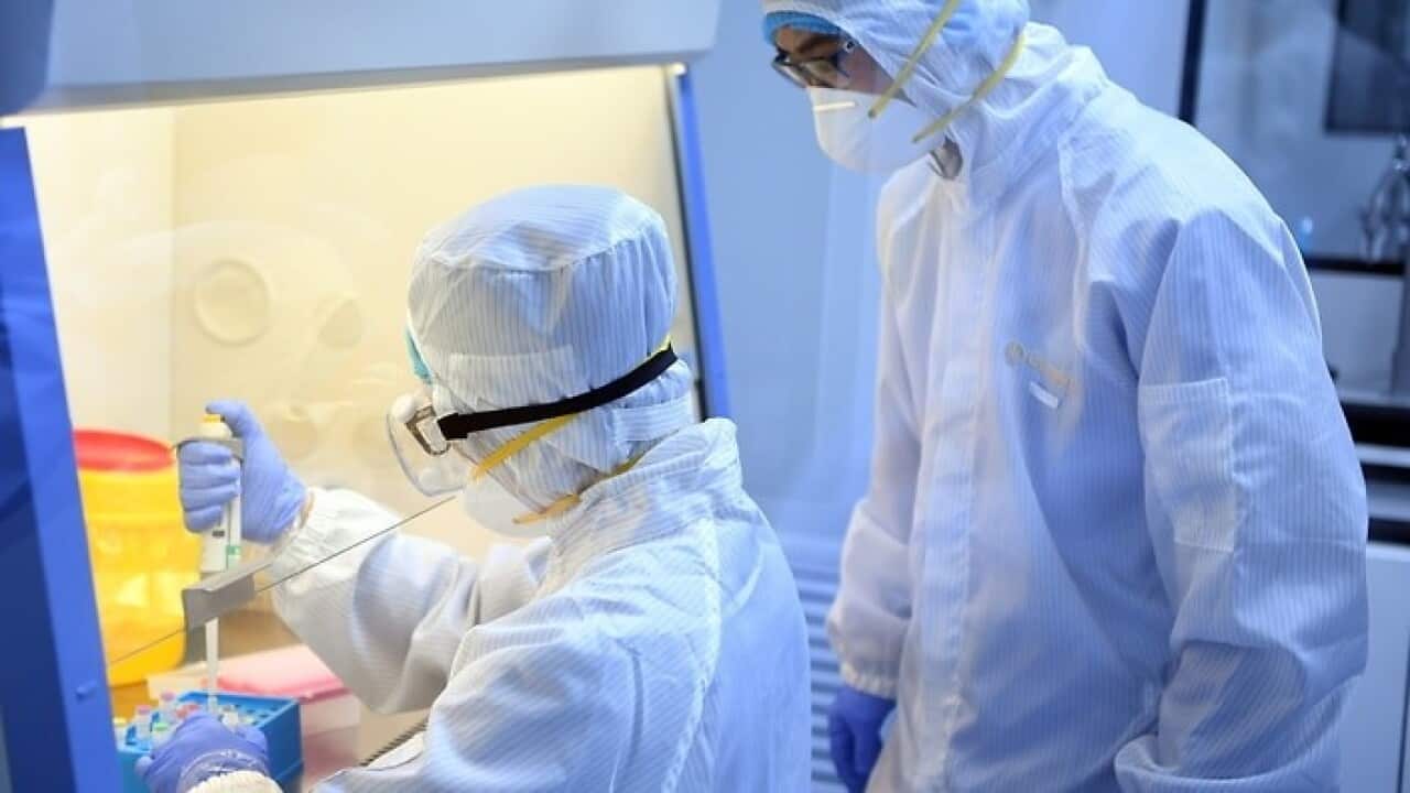 Researchers at a company in Wuqing District, Tianjin Municipality, China, 27 January 2020.