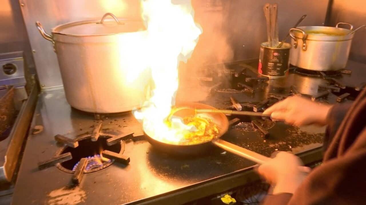 Cooking a curry (SBS)