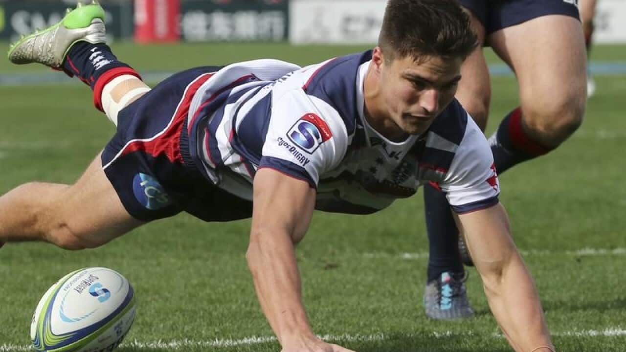 Jack Maddocks of the Rebels scores a try against Japan's Sunwolves.