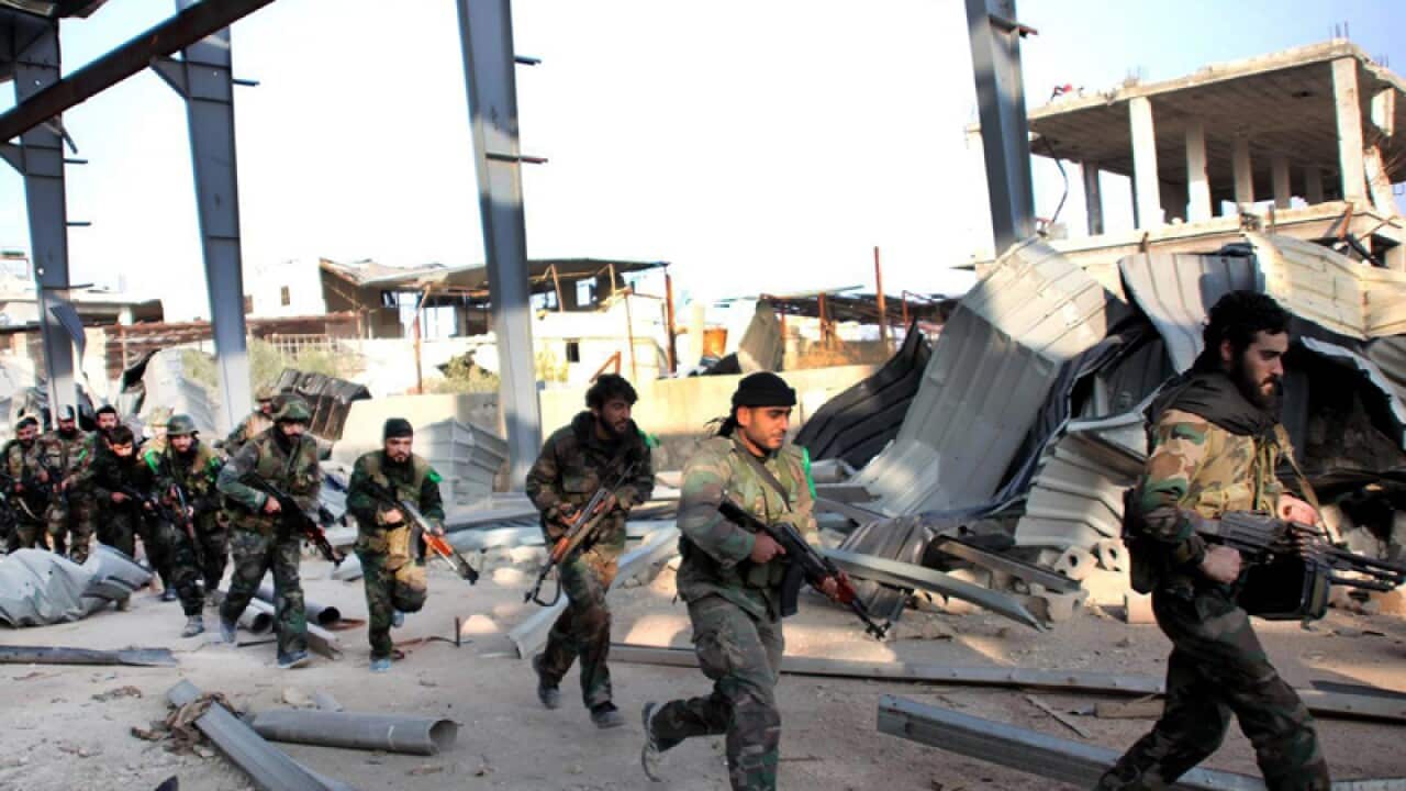 Syrian army soldiers during a patrol near Aleppo.