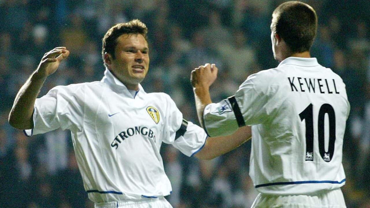Mark Viduka and Harry Kewell celebrate a goal for Leeds.
