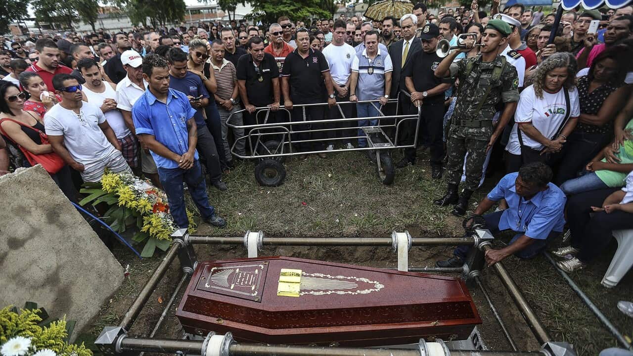 A large crowd of mourners attend the funeral of policeman Mario Marcelo Albuquerque, who was killed in the line of duty in Serra, Brazil, 08 February 2017.