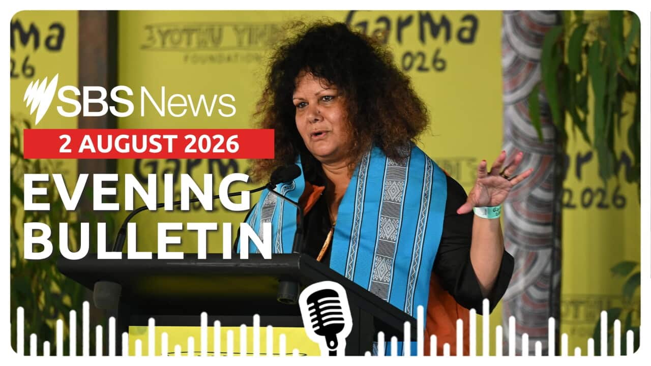 Malarndirri McCarthy gestures with her left hand while standing behind a lectern at the Garma Festival.