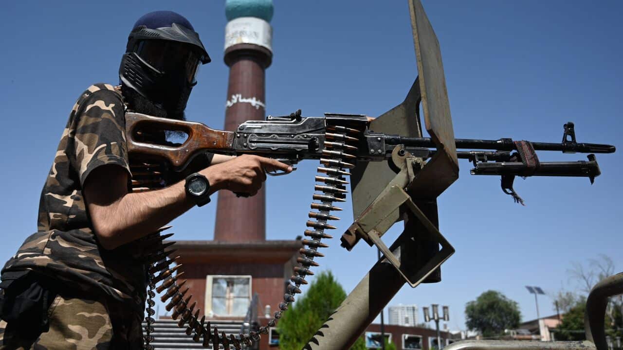 A member of the Taliban Fateh, a "special forces" unit, patrols on a vehicle at Massoud square in Kabul on September 8, 2021. (Photo by Aamir QURESHI / AFP) (Photo by AAMIR QURESHI/AFP via Getty Images)