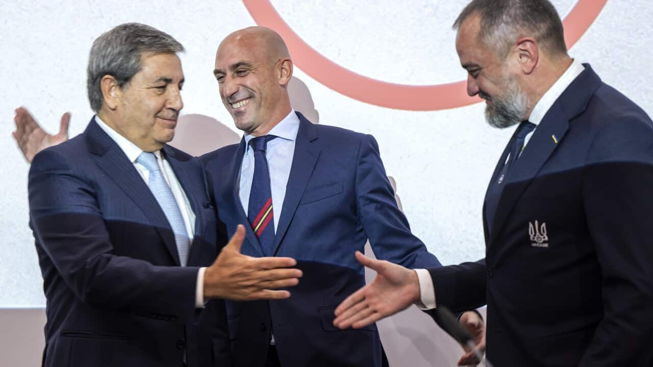 Portuguese Soccer Federation President Fernando Gomes, President of the Spanish Royal Federation of Soccer (RFEF), Luis Rubiales and Ukrainian Football Federation President Andriy Pavelko shake hands during a press conference.