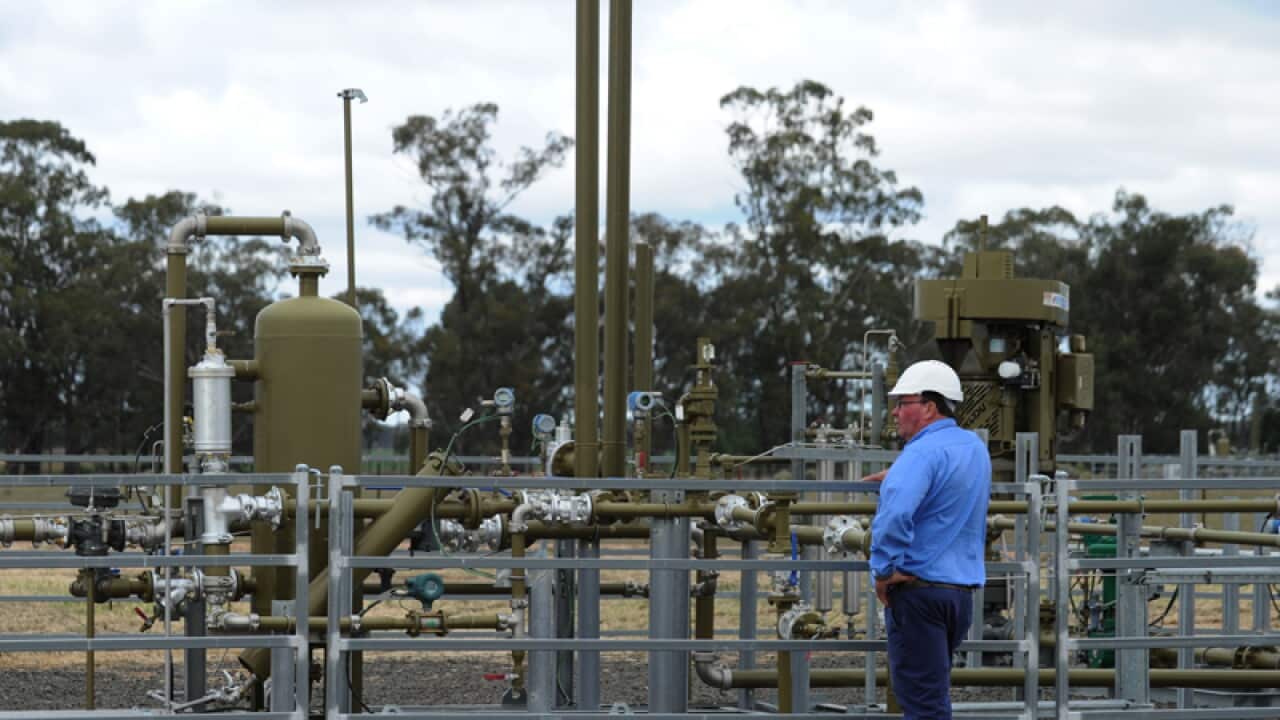 Santos staff at the Tinsfield coal seam gas pilot well
