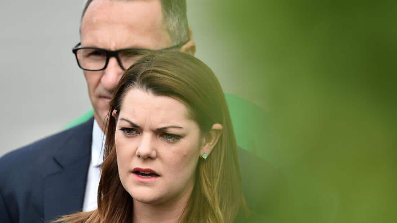 Australian Greens Leader Dr Richard Di Natale (left) and Greens Senator Sarah Hanson-Young address the media in St Kilda in the federal seat of Melbourne Ports in Melbourne, Monday, May 16, 2016. (AAP Image/Julian Smith) NO ARCHIVING