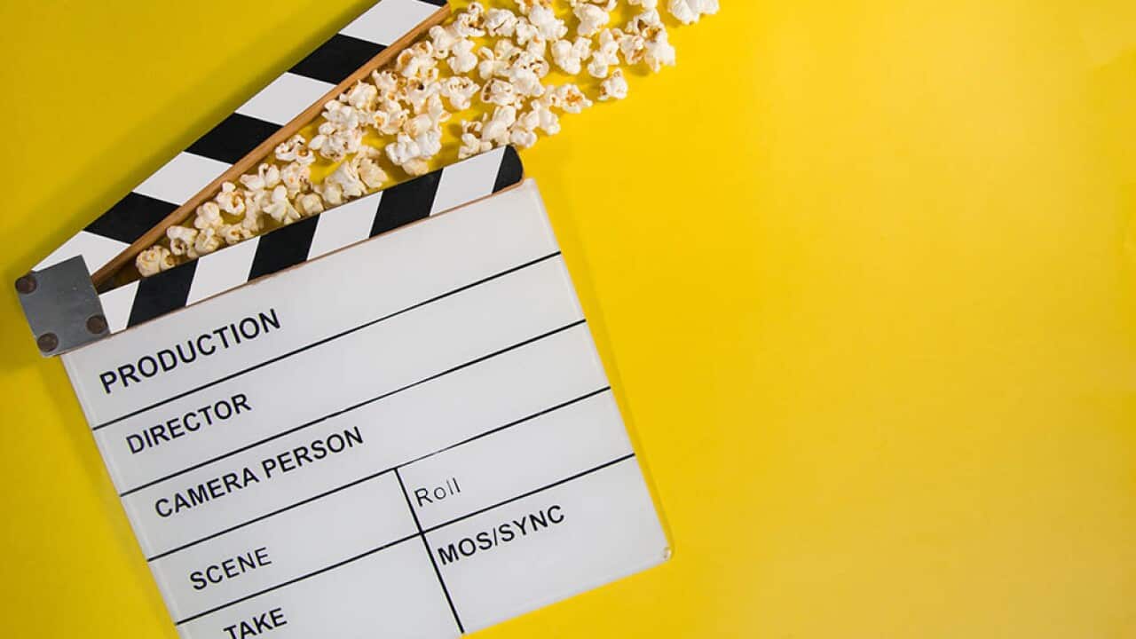 clapperboard and popcorn